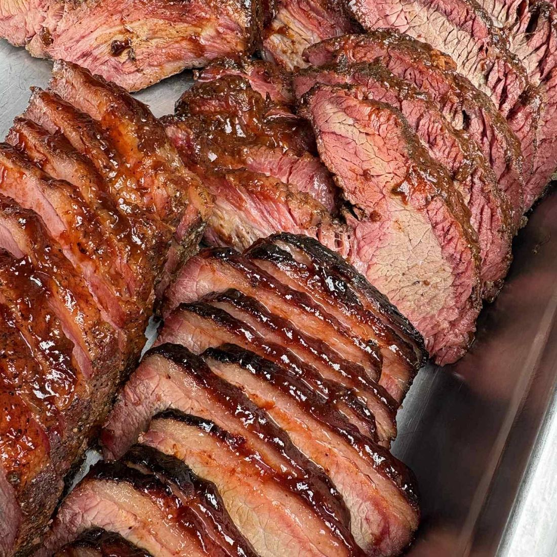 Glazed sliced meat carved for service
