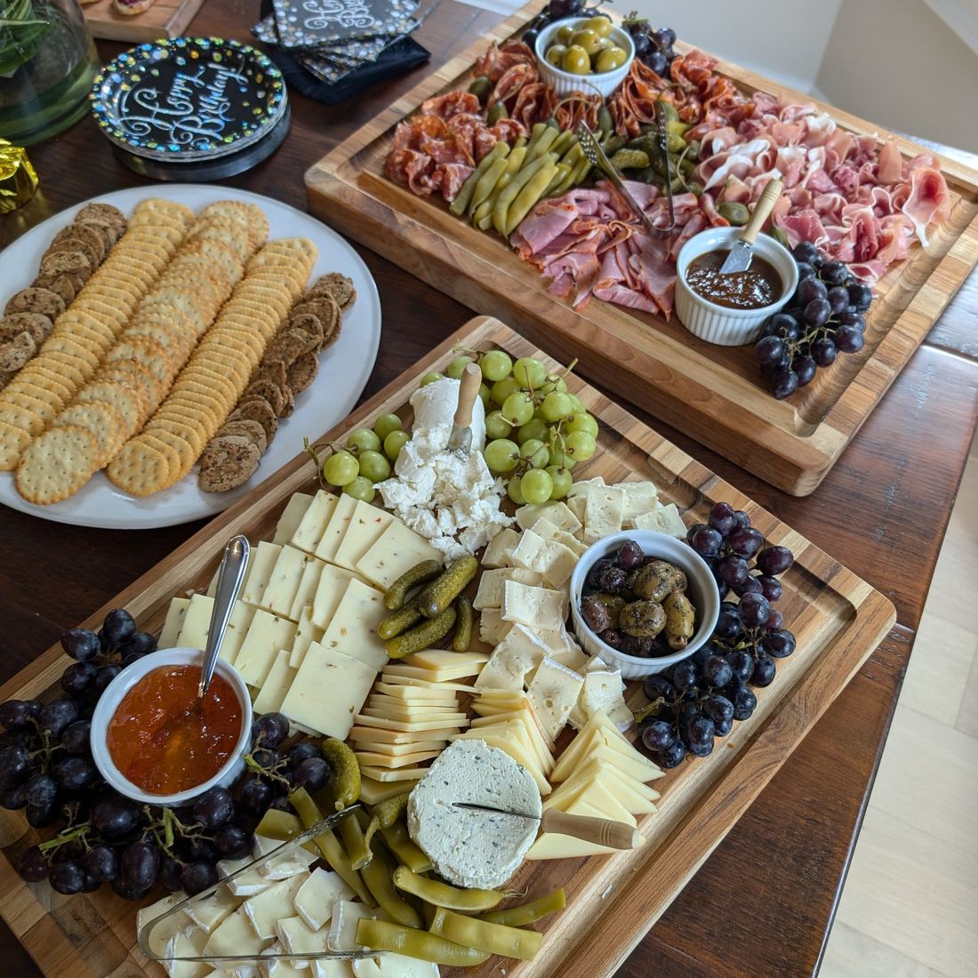 Charcuterie and cheese boards with fruit and preserves